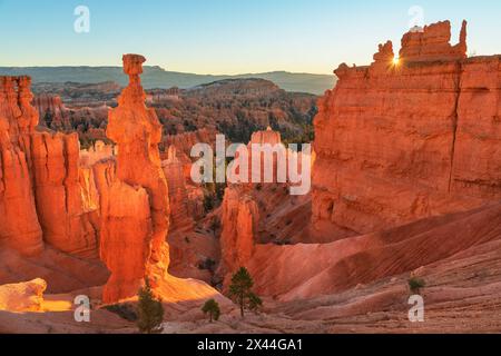 Sunrise view of Thor's Hammer and colorful hoodoos seen from below the canyon rim at Sunrise Point, Bryce Canyon National Park, Utah. Stock Photo