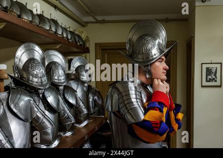Vatican, Vatican City. 30th Apr, 2024. Vatican, Vatican City, 30th April 2024. A Vatican Swiss Guard recruit wears his helmet before to attend the the rehearsal of the upcoming swearing-in ceremony. 34 new Swiss Guards are expected to swear in St. Damaso courtyard on 6th May. Credit: Riccardo De Luca - Update Images/Alamy Live News Stock Photo