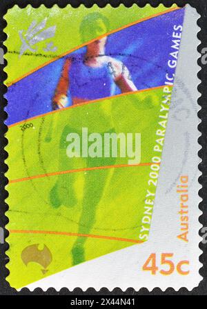 Cancelled postage stamp printed by Australia, that shows Amputee Sprinting,  Paralympic Games 2000 - Sydney, circa 2000. Stock Photo