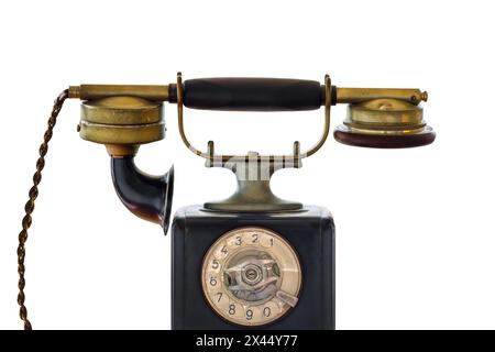 Early twentieth century black telephone isolated on a white background Stock Photo