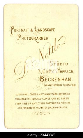 Reverse of original Victorian Carte de Visite (visiting card or CDV) photographic studio of D. Nottle of 3 Clifton Terrace, Beckenham, Greater London (was in county of Kent) U.K. Circa 1880's Stock Photo