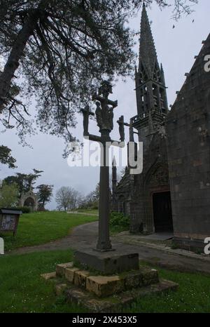 Le Faou, France - Apr 6, 2024: Eglise Notre Dame De Rumengol. Cloudy spring day. Selective focus Stock Photo