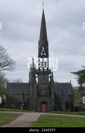 Le Faou, France - Apr 6, 2024: Eglise Notre Dame De Rumengol. Cloudy spring day. Selective focus Stock Photo