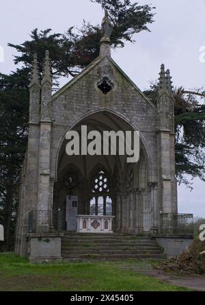 Le Faou, France - Apr 6, 2024: Eglise Notre Dame De Rumengol. Cloudy spring day. Selective focus Stock Photo