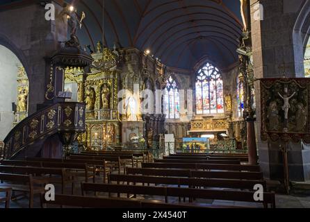 Le Faou, France - Apr 6, 2024: Eglise Notre Dame De Rumengol. Cloudy spring day. Selective focus Stock Photo