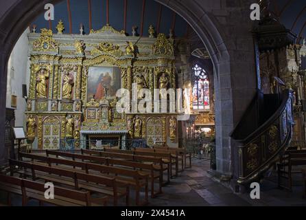 Le Faou, France - Apr 6, 2024: Eglise Notre Dame De Rumengol. Cloudy spring day. Selective focus Stock Photo