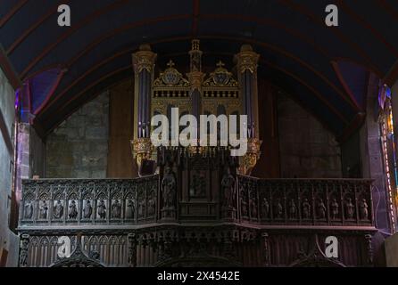 Le Faou, France - Apr 6, 2024: Eglise Notre Dame De Rumengol. Cloudy spring day. Selective focus Stock Photo