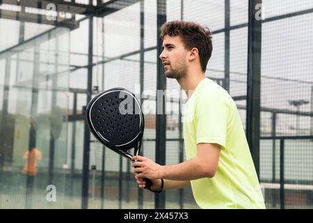 young man ready to play paddle tennis Stock Photo