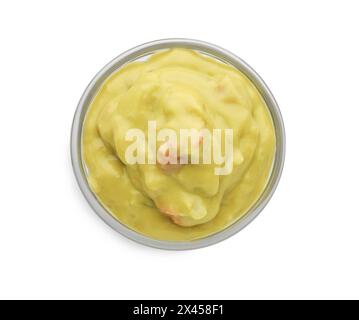 Delicious guacamole sauce in bowl isolated on white, top view Stock Photo