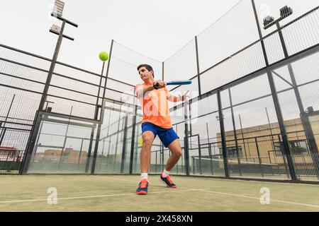 man playing paddle tennis. backhand Stock Photo