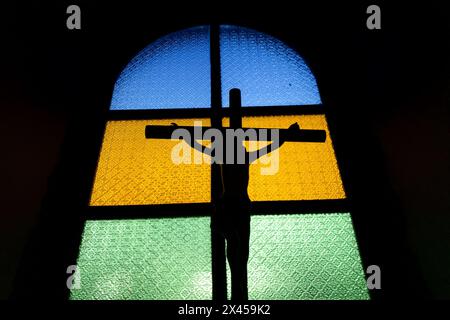 Silhouette of Jesus on the cross. Stock Photo