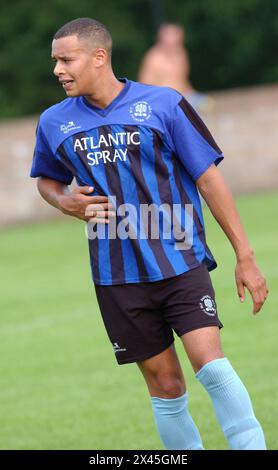 Kyle Johnson plays football for Ely Rangers tonight ( 28/7/04) watched by girlfriend Charlotte Church after hoaxing four London snappers as she shopped for a birthday present for friend Noel Sullivan earlier in the day. Stock Photo