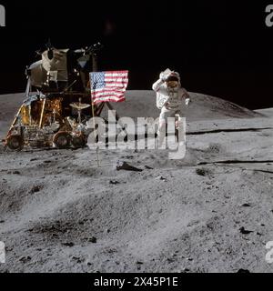 Astronaut John Young saluting the USA flag on the Apollo 16 moon landing mission in 1972 Stock Photo