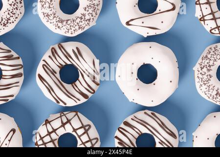 Trendy sunlight Summer pattern made with glazed donut with sprinkles on a blue background. 3d render of fast food concept, bakery and design elements Stock Photo