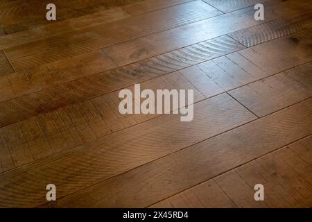 Hard wood natural floor for use as texture background, with diagonal planks. Stock Photo