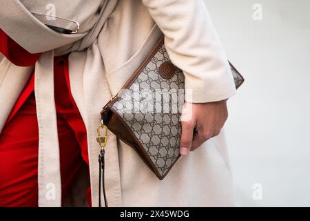 Milan, Italy - January, 10, 2024: man wears Louis Vuitton bag, fashion blogger outfit details Stock Photo