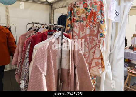 Traditional Japanese clothing for women sold in a boutique during sakura festival Stock Photo