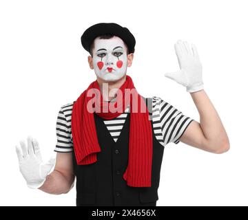 Funny mime artist in beret posing on white background Stock Photo