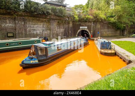 Narrowboat coming out of the North portal of the Harecastle Tunnel at Kidsgrove in Staffordshire, built by renowned canal engineer Thomas Telford Stock Photo