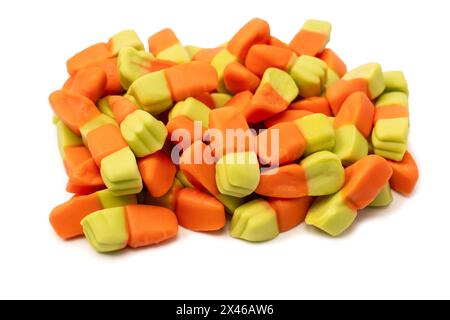 Juicy colorful jelly sweets isolated on white. Gummy candies. Jelly carrots. Stock Photo