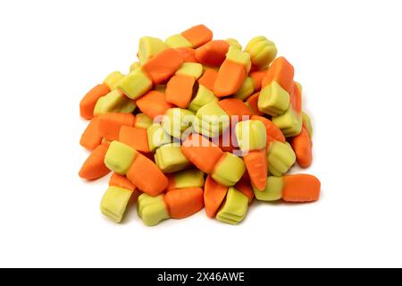 Juicy colorful jelly sweets isolated on white. Gummy candies. Jelly carrots. Stock Photo