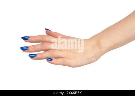 Hand of a woman with blue nails isolated on a white background. Stock Photo