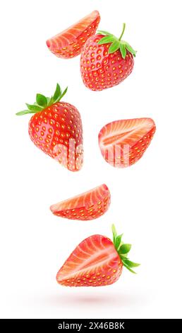 Cut strawberries levitation isolated on white background Stock Photo