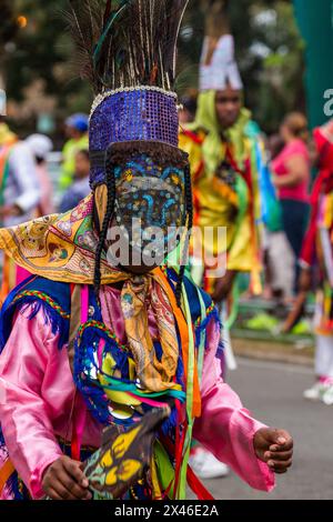 Los Guloyas of San Pedro de Macoris in the La Vega Carnival parade in the Dominican Republic.  They are descendents of slaves brought to the island fr Stock Photo