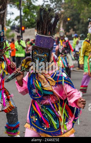 Los Guloyas of San Pedro de Macoris in the La Vega Carnival parade in the Dominican Republic.  They are descendents of slaves brought to the island fr Stock Photo