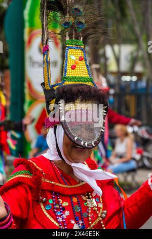 Los Guloyas of San Pedro de Macoris in the La Vega Carnival parade in the Dominican Republic.  They are descendents of slaves brought to the island fr Stock Photo