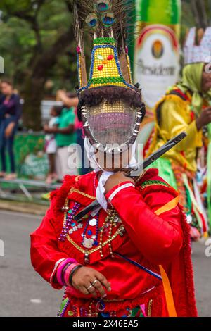 Los Guloyas of San Pedro de Macoris in the La Vega Carnival parade in the Dominican Republic.  They are descendents of slaves brought to the island fr Stock Photo