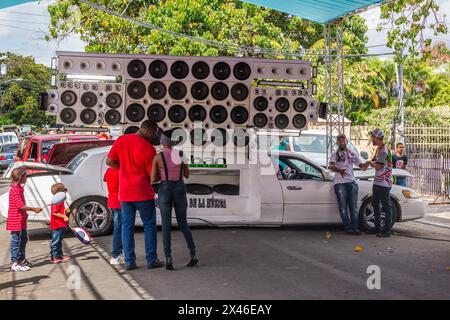 A giant stretch limousine boom box sound system at the La Vega Carnival in the Dominican Republic.  The first documented Carnival celebration in what Stock Photo