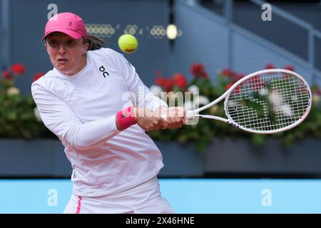 Madrid, Spain. 30th Apr, 2024. Iga Swiatek of Poland against Haddad during their Women's Quarter-Final match on day eight of the Mutua Madrid Open at La Caja Magica on April 30, 2024 in Madrid, Spain (Photo by Oscar Gonzalez/Sipa USA) Credit: Sipa USA/Alamy Live News Stock Photo