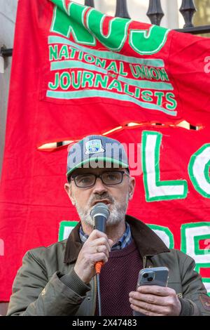 Whitehall, London, UK. Monday 29th April, 2024. To mark International Workers' Memorial Day The National Union of Journalist London Freelance Branch held a rally and vigil opposite Downing Street. Speeches were held remembering and commemorating journalist and media workers killed by the Israeli military in its ongoing war on the people of Gaza. Abdullah Bailey/Alamy Live News Stock Photo