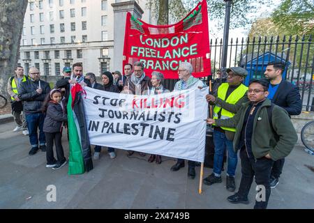 Whitehall, London, UK. Monday 29th April, 2024. To mark International Workers' Memorial Day The National Union of Journalist London Freelance Branch held a rally and vigil opposite Downing Street. Speeches were held remembering and commemorating journalist and media workers killed by the Israeli military in its ongoing war on the people of Gaza. Abdullah Bailey/Alamy Live News Stock Photo