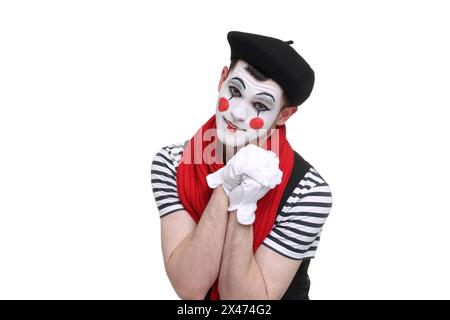 Funny mime artist in beret posing on white background Stock Photo
