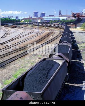 Coal trains arriving at the Newcastle steel works, New South Wales  from the Hunter valley coal mines. Stock Photo