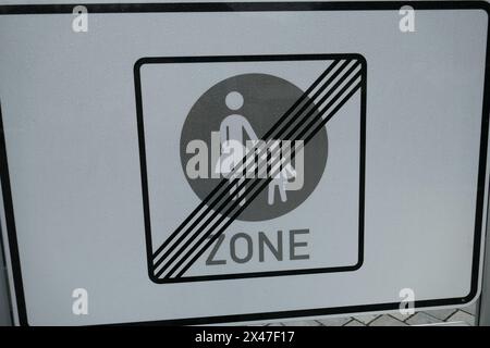 No pedestrian sign with icon of mother and child holding hands crossed out Stock Photo