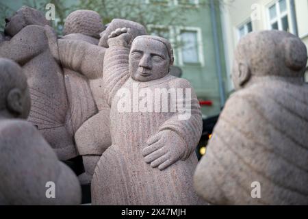 Skvallertorget or the Gossip square with a granite sculpture by Pye Engstrom in Norrköping, Sweden.  Norrköping is a historic industrial town. Stock Photo