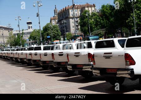 KYIV, UKRAINE - APRIL 30, 2024 - New Toyota Hilux SUVs purchased by the capital for the soldiers of the 3rd Separate Assault Brigade of the Land Forces, outside the Kyiv City State Administration, Kyiv, capital of Ukraine. Stock Photo