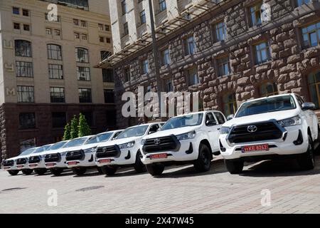 KYIV, UKRAINE - APRIL 30, 2024 - New Toyota Hilux SUVs purchased by the capital for the soldiers of the 3rd Separate Assault Brigade of the Land Forces, outside the Kyiv City State Administration, Kyiv, capital of Ukraine. Stock Photo