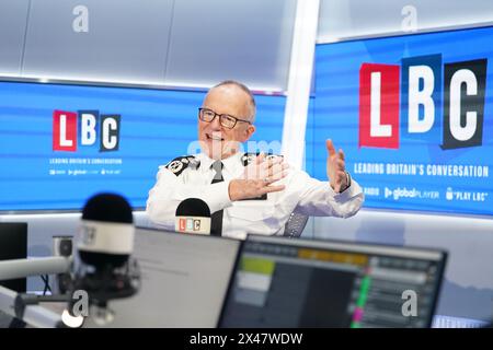 Metropolitan Police Commissioner Sir Mark Rowley takes part in Call the Commissioner, his live phone-in on LBC's Nick Ferrari at Breakfast show, at the Global Studios, London. Picture date: Wednesday May 1, 2024. Stock Photo