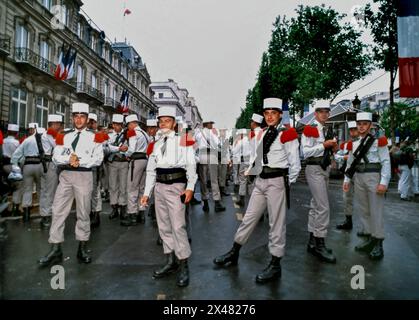 PARIS, France - Crowd People, French Soldiers, Public Events, 14th of July,  Bastille Day,  Foreign Legion Army on Champs-Elysees. Before Parade Stock Photo