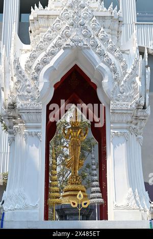 Close-up of the principal image at the Trimurti shrine, a representation of the 3 aspects of God, a landmark at Central World Mall, Bangkok Stock Photo