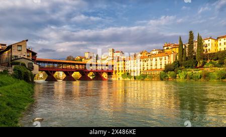 Antique wooden covered red bridge. Ponte Vecchio or Ponte degli Alpini over Brenta river, Bassano del Grappa, Vicenza province, Veneto region, Italy. Stock Photo