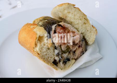 Raucherrollmops or Smoked Rollmops Fischbrotchen Fish Sandwich in Hamburg, Germany Stock Photo