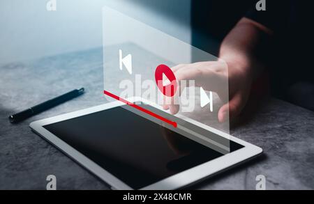 Woman watching a live stream. Online stream window interface. Video streaming on internet concept. Multimedia player on digital tablet. Stock Photo