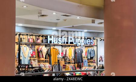 Hush Puppies store, Hush Puppies is an American casual and contemporary shoe brand that is marketed internationally. Bekasi, Indonesia, May 1, 2024 Stock Photo