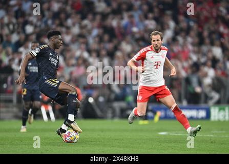 MUNICH, GERMANY - APRIL 30: Aurelien Tchouameni of Real Madrid  and Harry Kane of FC Bayern Munchen during the UEFA Champions League semi-final first Stock Photo