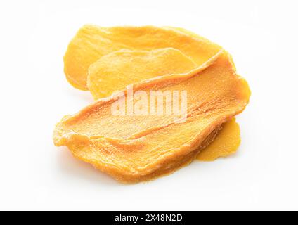 Slices of large sweet dried mangoes on white background.Mcaro Stock Photo